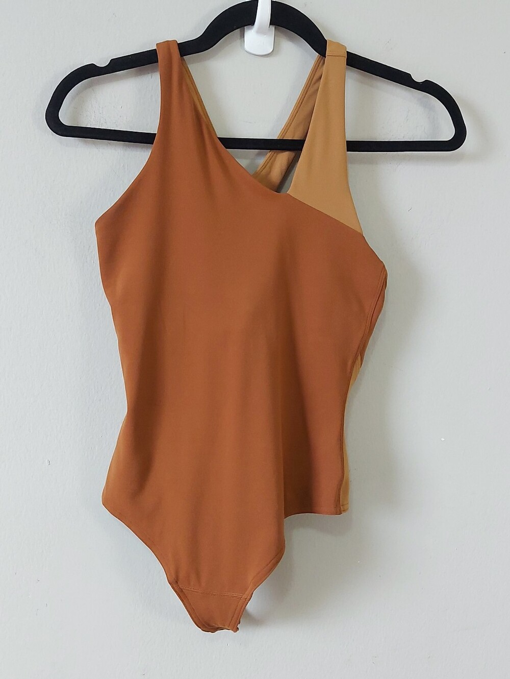 Lululemon Asymmetrical Crisscross Thong Bodysuit Size 4 Edgy Two Tone Sleeveless